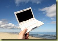 White small  Laptop on the beach