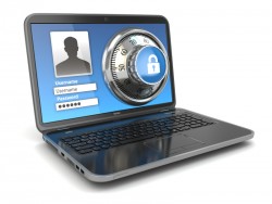 Internet Security.  Laptop and safe lock. Jerry Kidd